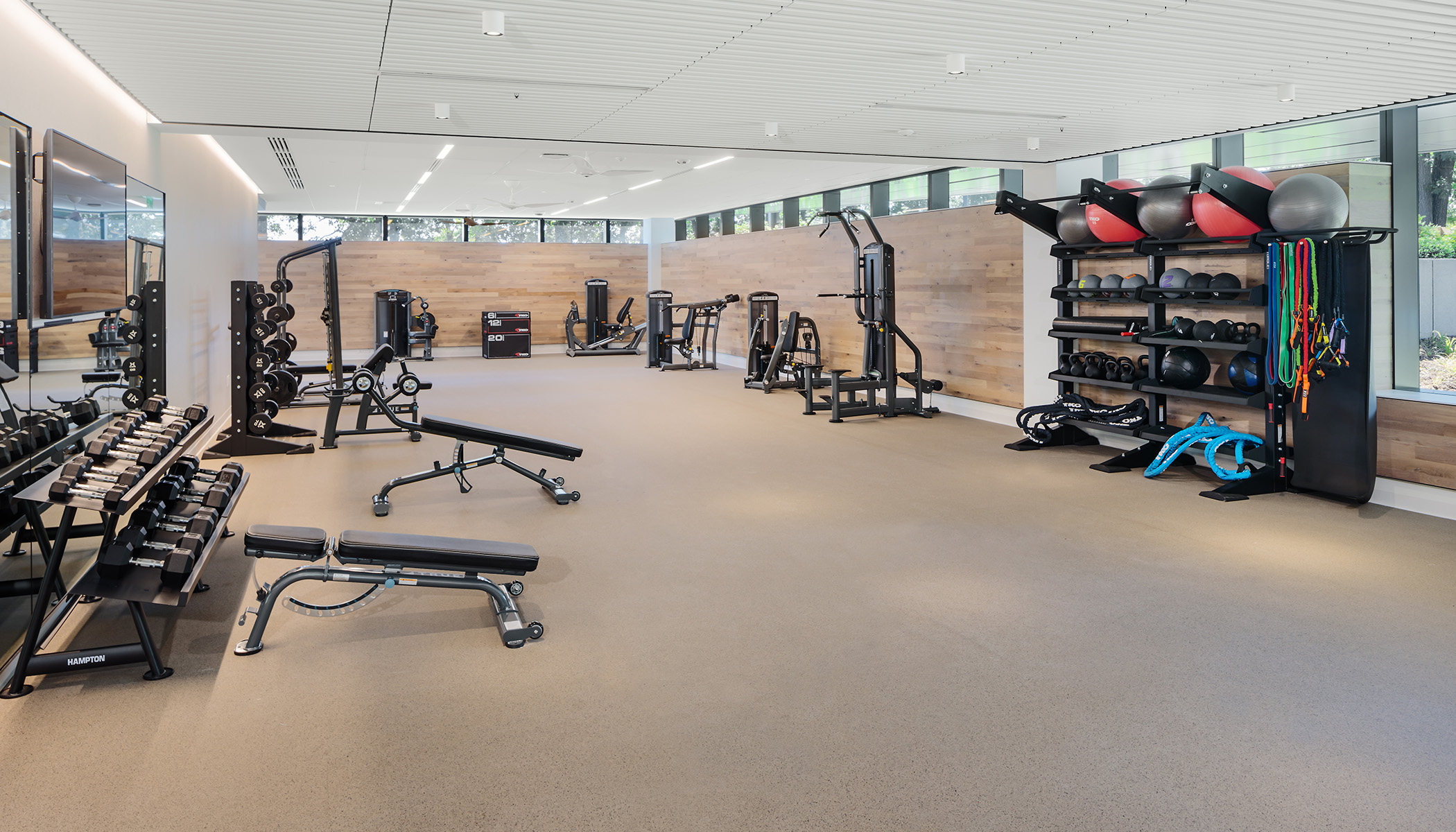 10,000 SF BOUTIQUE FITNESS CENTER WITH SPA-INSPIRED LOCKER ROOMS